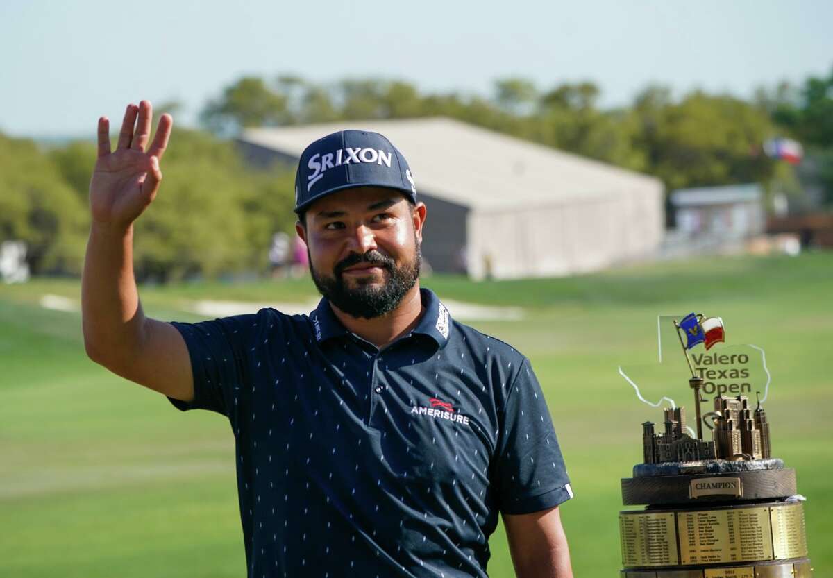 J.J. Spaun waves to the crowd after winning Sunday’s final round of the Valero Texas Open. Spaun finished with a 3-under 69 to finish 13-under, two strokes ahead of Matt Jones and Matt Kuchar.