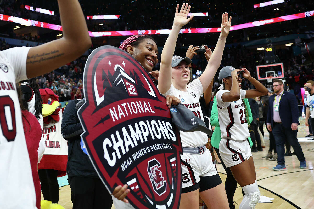 Aliyah Boston of the South Carolina Gamecocks holds a national champions sign after defeating the UConn Huskies 64-49 during the 2022 NCAA Women's Basketball Tournament National Championship game at Target Center on April 03, 2022 in Minneapolis, Minnesota. 