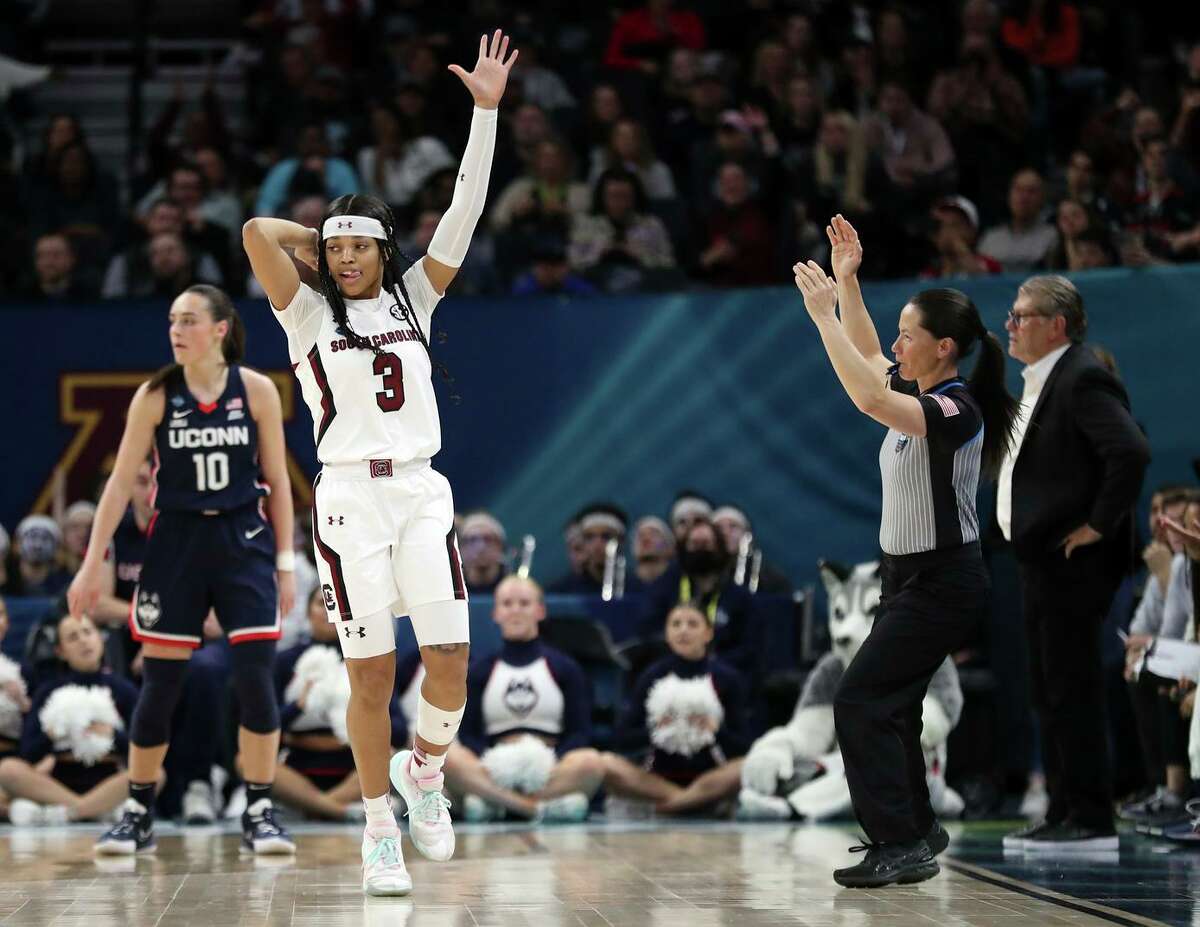 South Carolina’s Destanni Henderson celebrates a 3-pointer in the second quarter against UConn. Henderson contributed 26 points and 4 assists as the Gamecocks secured the title.