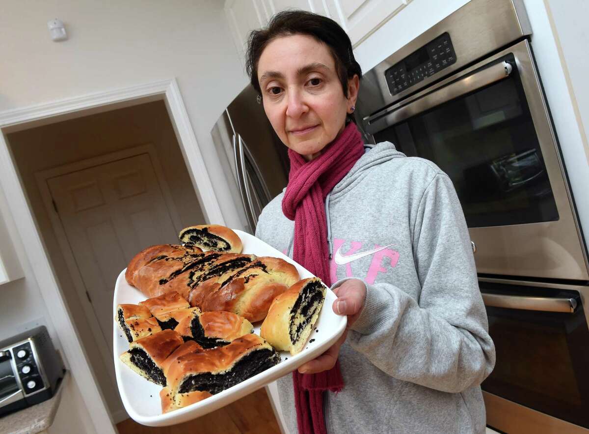 Irina Esterlis, photographed on March 30, 2022, has been baking and selling poppy seed bread made in her kitchen in Guilford to aid Ukrainians in the war with Russia.