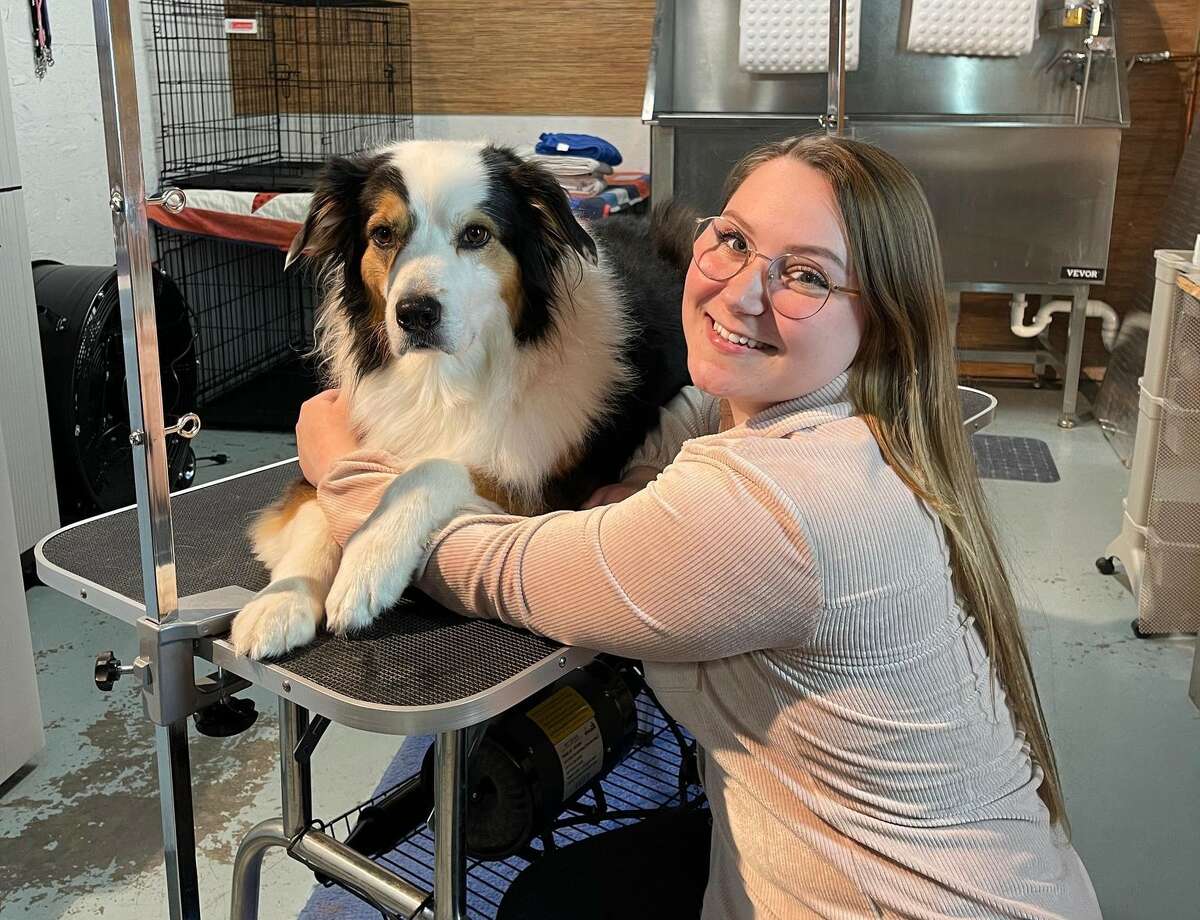 Dog groomer Kaitlyn Weaver opened her home salon, Barkin' Bandit, toward the end of 2021. 