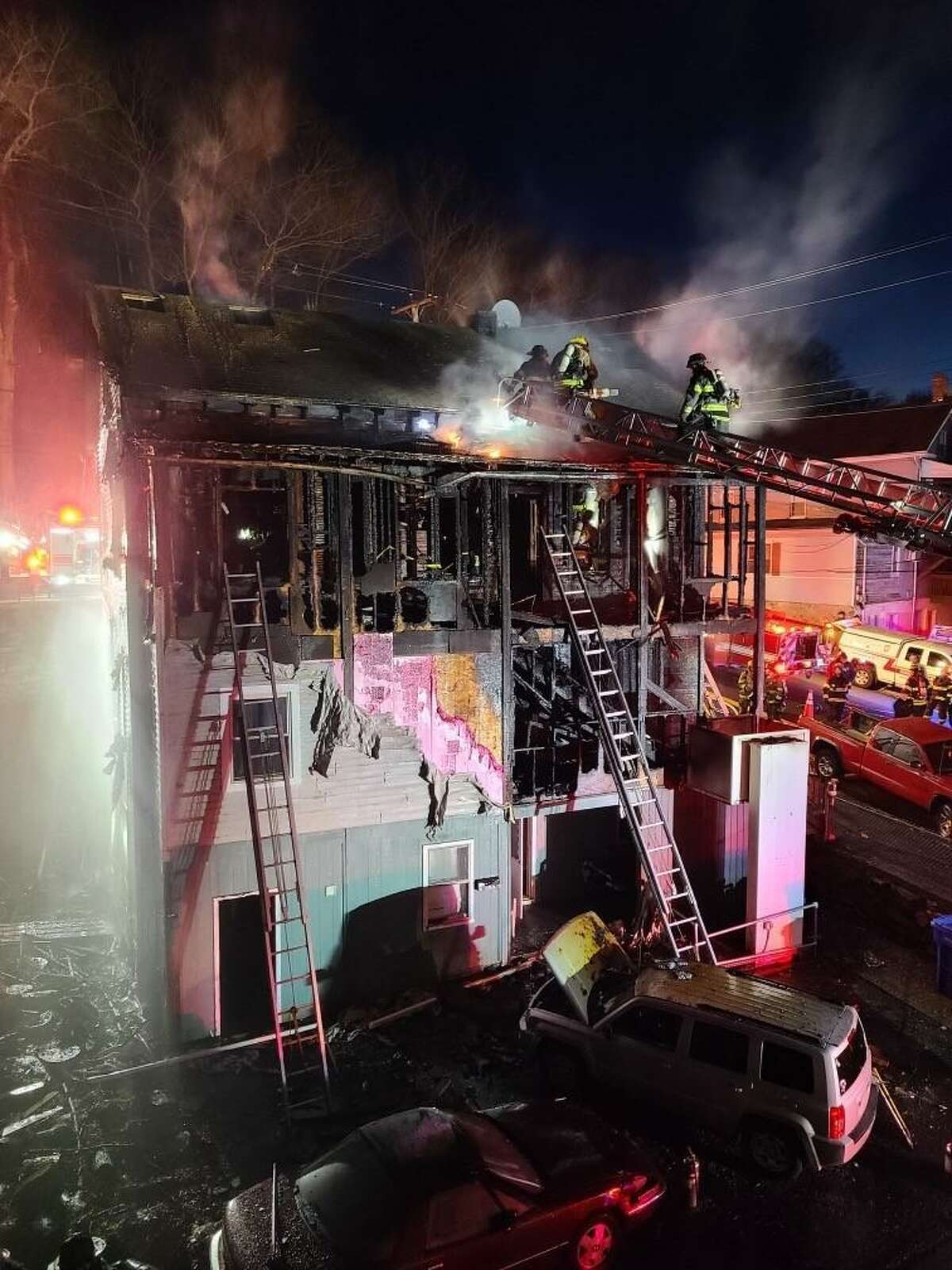 Shelton fire crews battled a three-story structure fire at the corner of Howe Avenue and Maple Street on April 1, 2022.