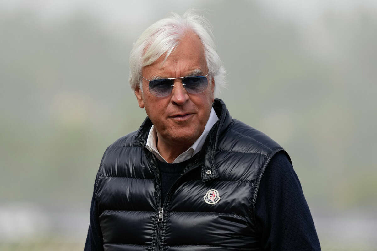 Trainer Bob Baffert waits for the Breeders' Cup horse races at Del Mar racetrack in Del Mar, Calif., Nov. 5, 2021. The New York Gaming Commission announced Monday Baffert will be suspended from racing in New York until at least July 2. (AP Photo/Jae C. Hong, File)