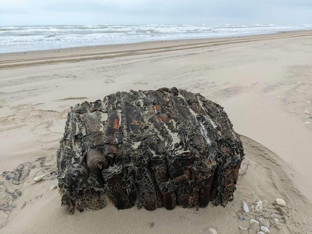 Rubber bales from a 1944 ship that was sunk in the Brazil coast are washing up on Texas beaches. 