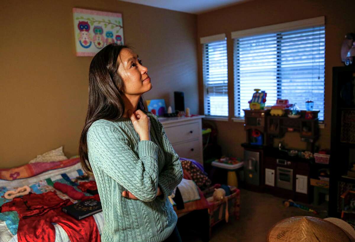 Truc-Co Jong stands in Ailee’s room in the family’s Danville home.
