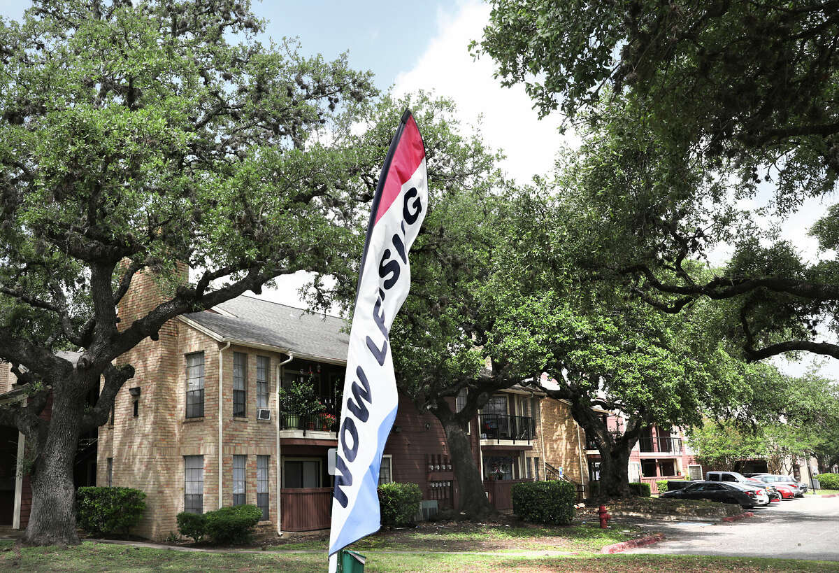 Two months into the pandemic, renters as well as landlords are still facing issues, on Friday, May 22, 2020. Leasing banners fly at Towering Oaks Apartments on Oakdell Way.