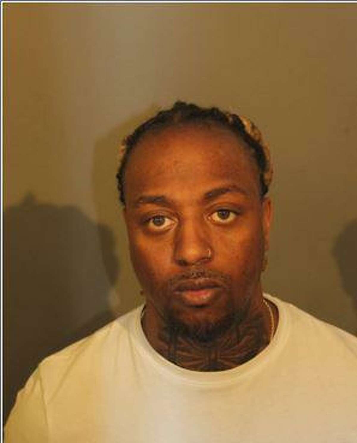 Two Danbury men were arrested Monday after allegedly being caught with drugs and a handgun, according to police. Here, Taurean Coleman.