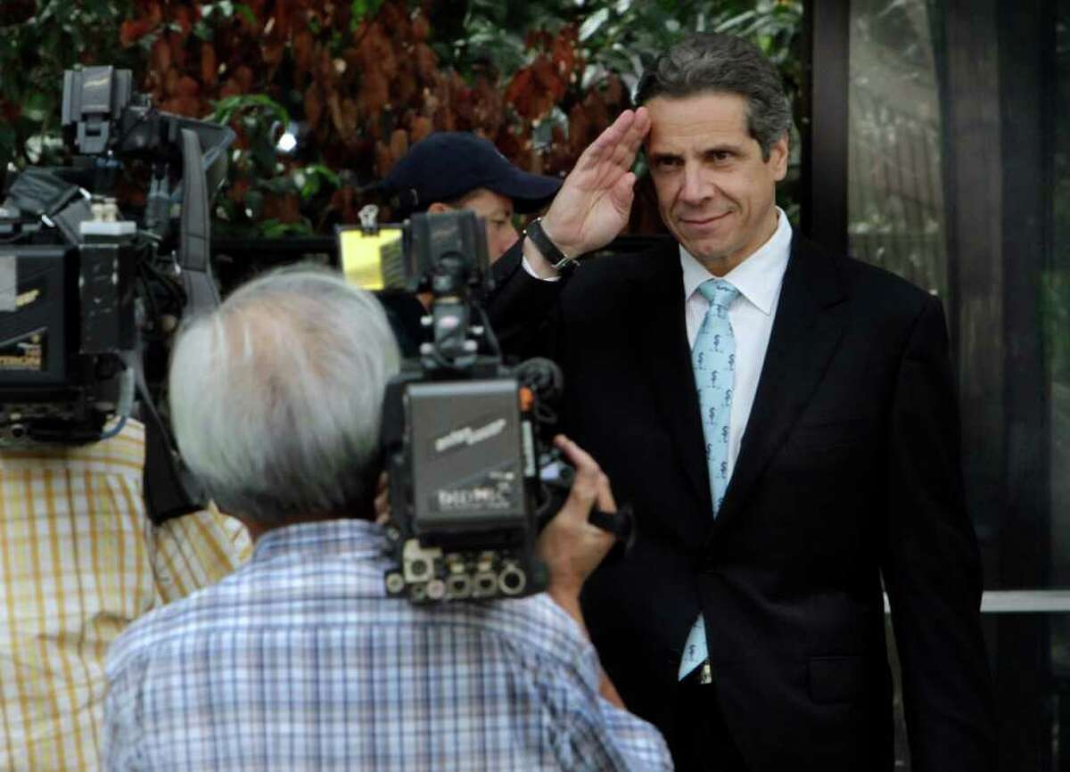 New York Democratic candidate for governor, state Attorney General Andrew Cuomo, salutes as he arrives at New York's City Hall, Wednesday, Sept. 29, 2010. Cuomo has picked up the endorsement of a prominent abortion rights group NARAL. (AP Photo/Richard Drew)