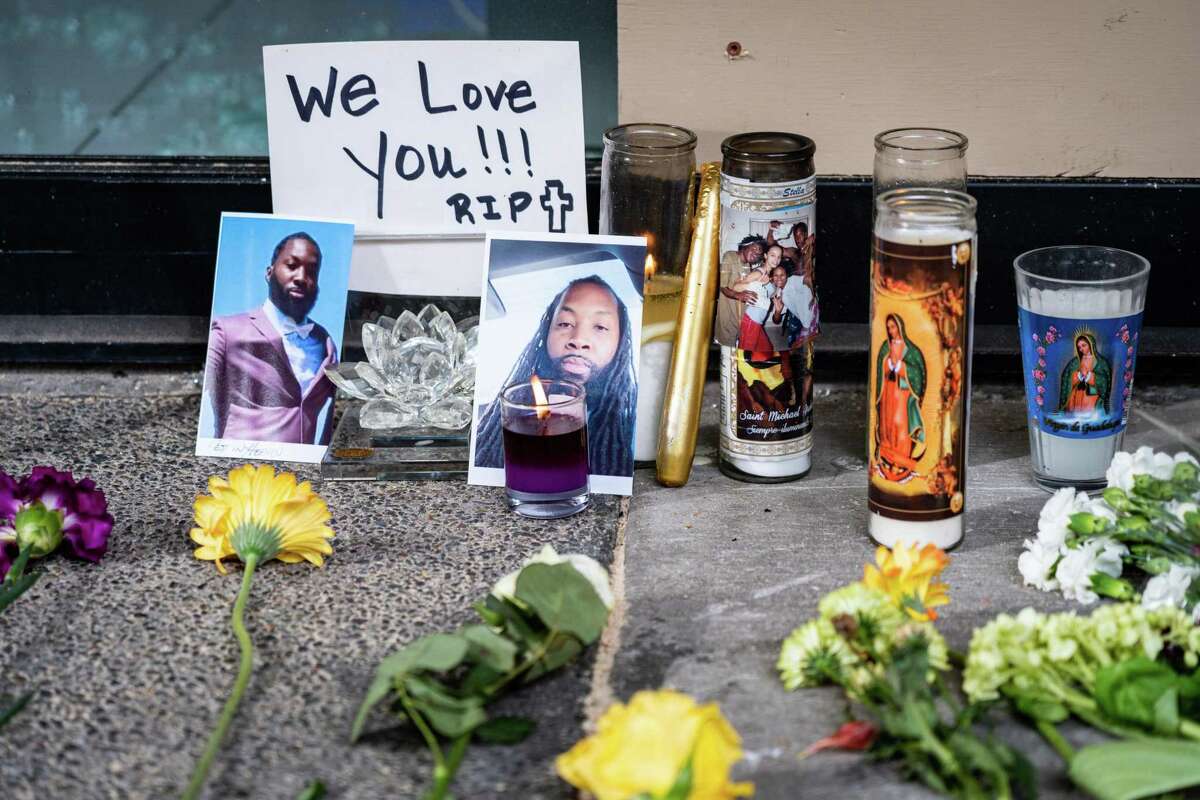 Flowers, photos and candles seen at a small memorial for Devazia Turner, one of the victims of the mass shooting.  The shooting that took place on 10th and K streets in Sacramento near the State Capitol killed 6 people and injured 12 others.