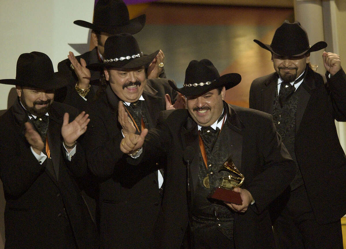 The group Ramon Ayala y sus Bravos del Norte accept their award for best norteno album during the 3rd annual Latin Grammy Awards in 2002. Ayala collapsed on stage during a performance this week. 