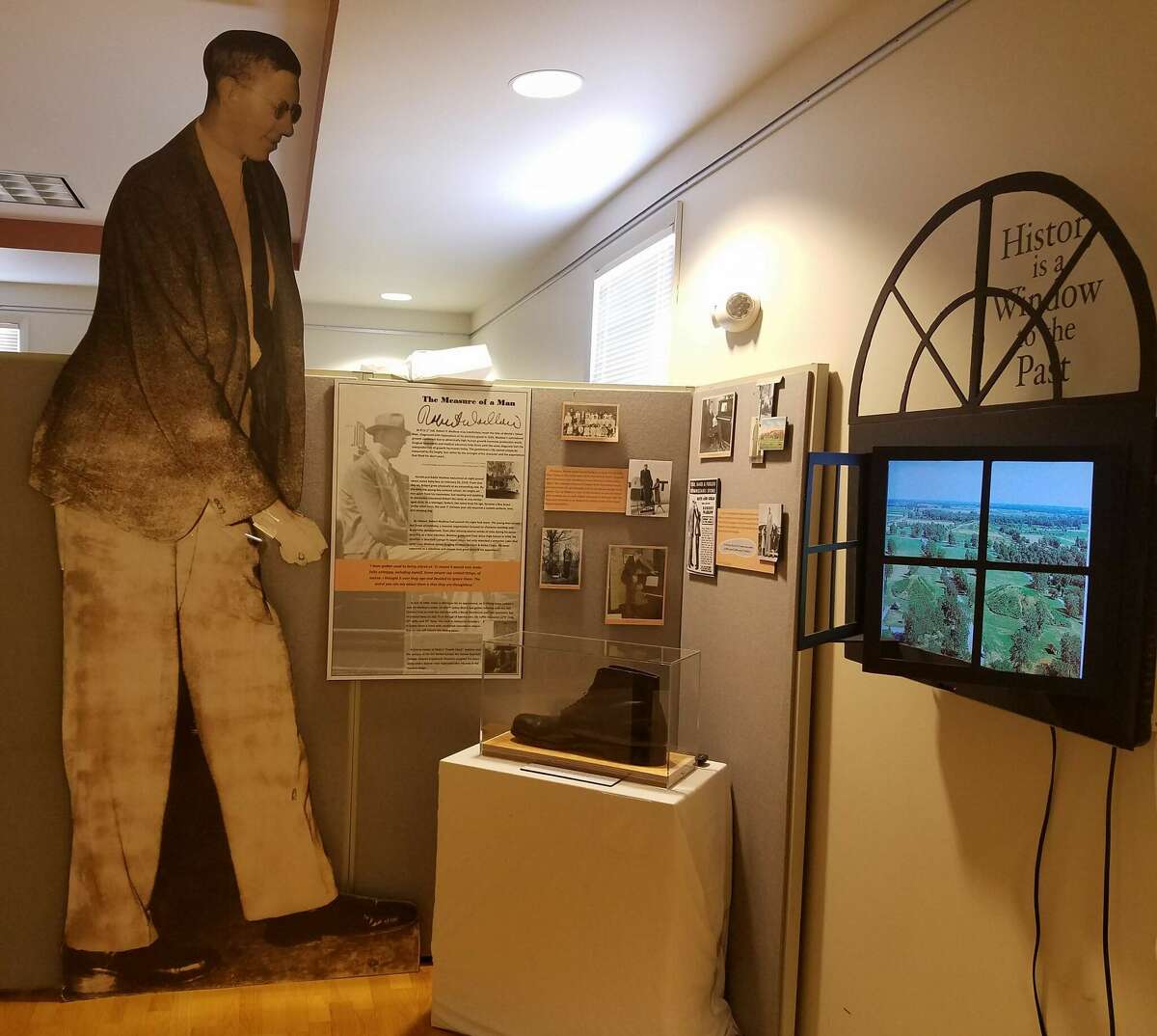 The Madison County Historical Society has added a gallery to the Archival Library at 801 N. Main St., Edwardsville. Pictured is "The Measure of a Man" on Robert Wadlow.