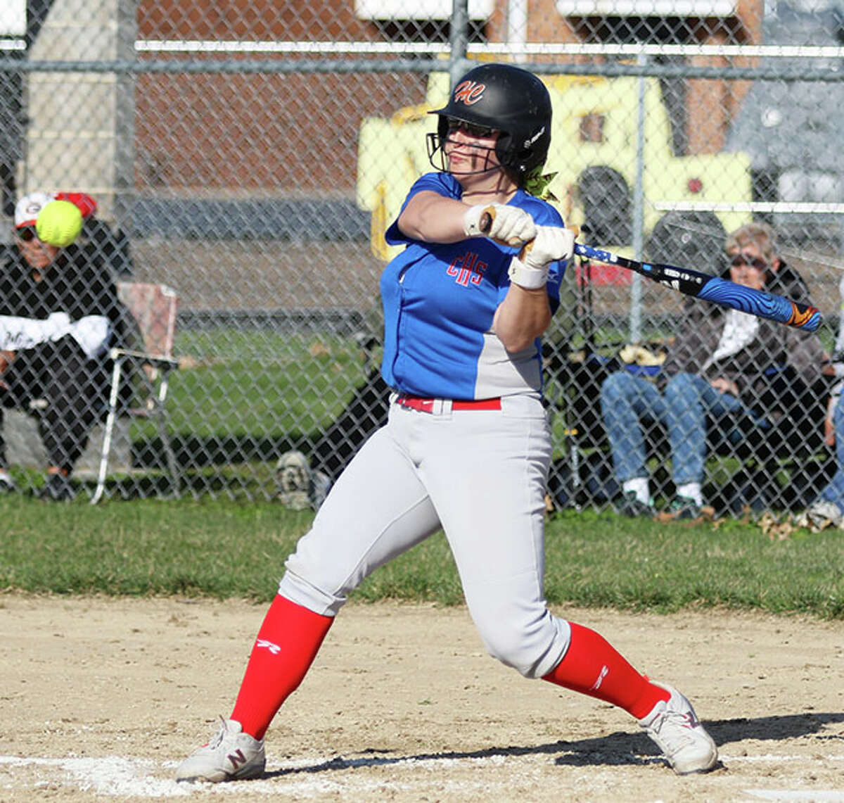 Carlinville's Isabella Tiburzi hits a double against Staunton on Monday at Staunton. Later in the 10th inning, Tiburzi hit a game-winning homer for the Cavaliers.