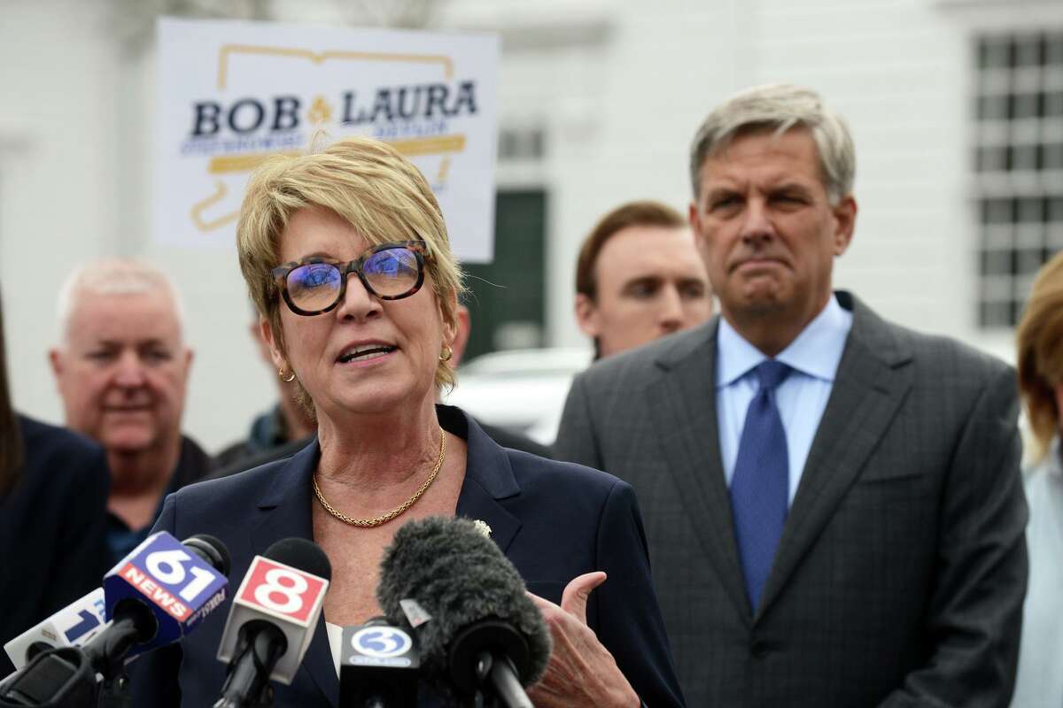 State Rep. Laura Devlin speaks during a news conference in front of Old Town Hall in Fairfield on Tuesday.At her side is Bob Stefanowski, Republican candidate for governor, who introduced her as his running mate.