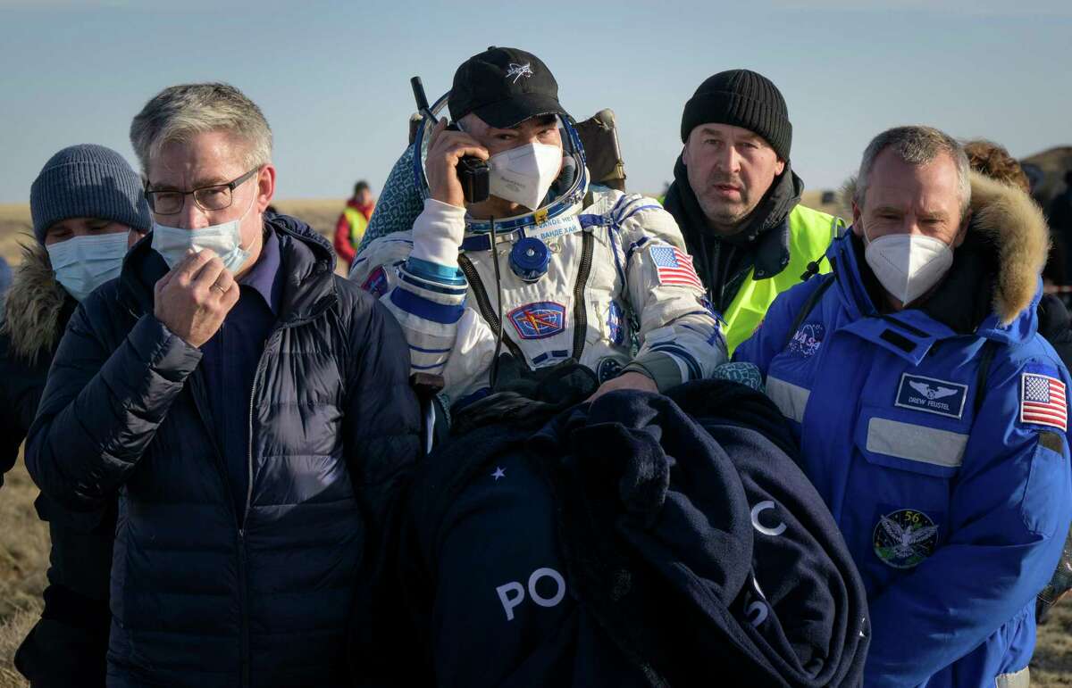 In this handout image provided by NASA, astronaut Mark Vande Hei is carried to a medical tent shortly after he and fellow crew mates Pyotr Dubrov and Anton Shkaplerov of Roscosmos landed in their Soyuz MS-19 spacecraft near the town of Zhezkazgan on March 30, 2022 in Zhezkazgan, Kazakhstan. (Photo by Bill Ingalls/NASA/Getty Images)