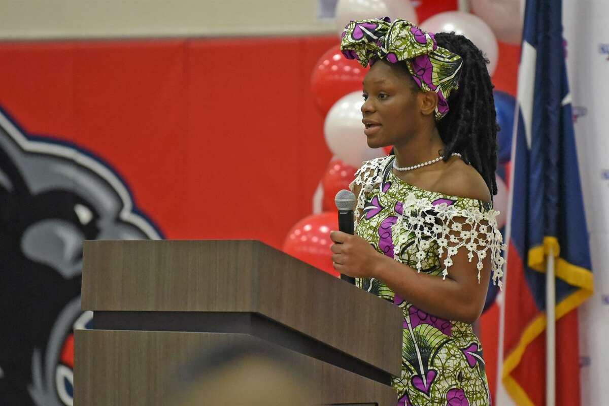 Cypress Springs High School sophomore Lumiere Kahongo reads a poem during the school’s Thousand Girls in Pearls and Guys in Ties brunch on March 11. The brunch finished a week’s worth of events on campus for the students and staff to continue their annual Empowerment Week.