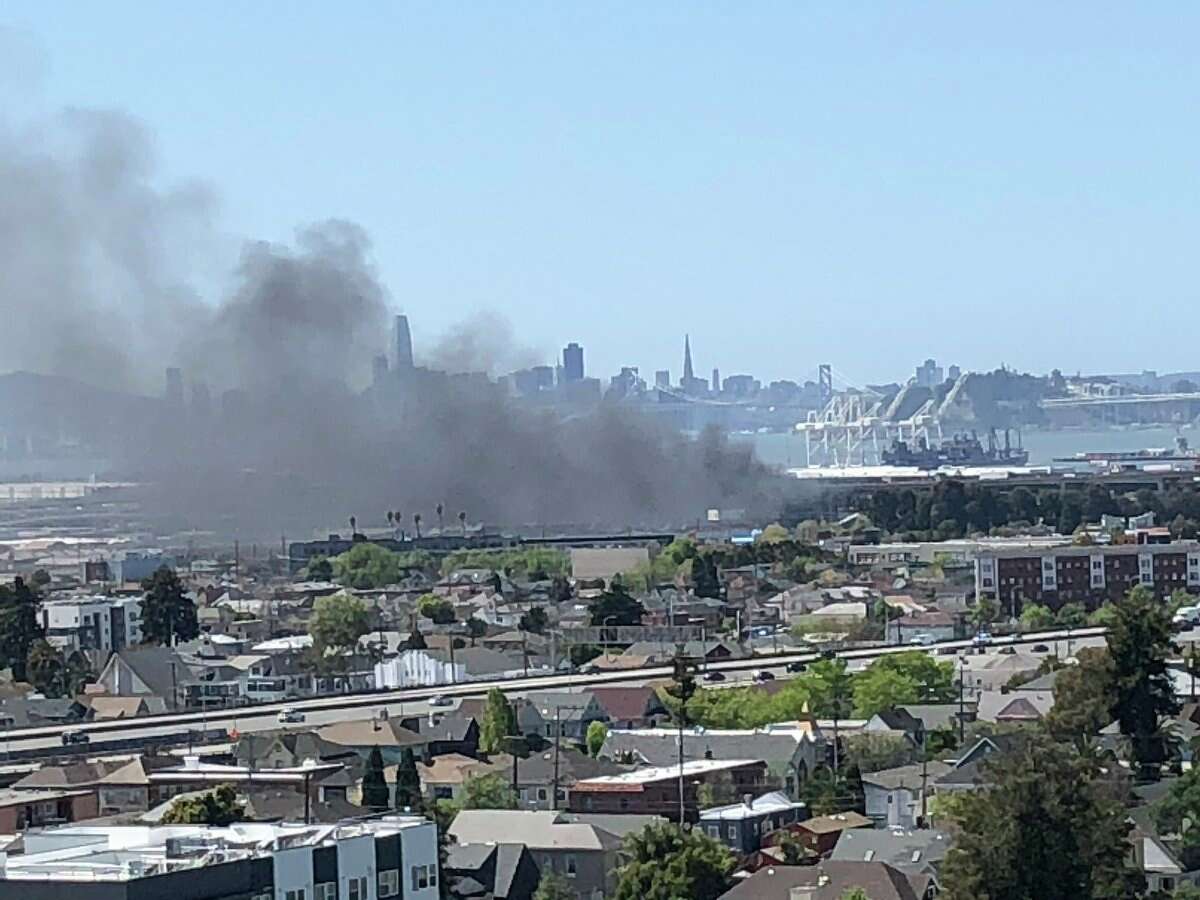 A fire broke out&nbsp;among cars and RVs parked at West Grand Avenue and Wood Street in Oakland on April 5, 2022.