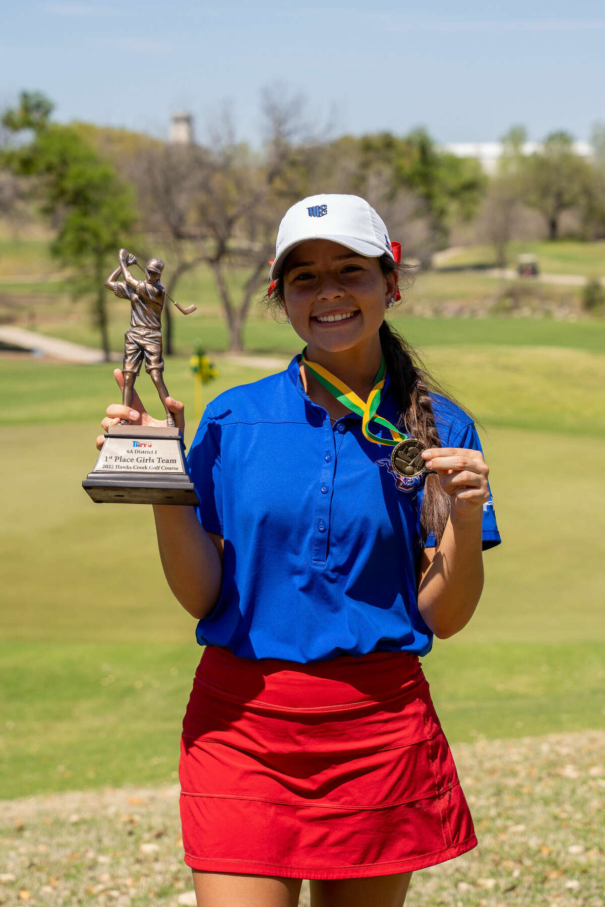 Midland Christian's Rylie Rodriguez poses after winning the TAPPS 1-6A medalist title at Hawks Creek Golf Course in Fort Worth on 4/5/2022. 