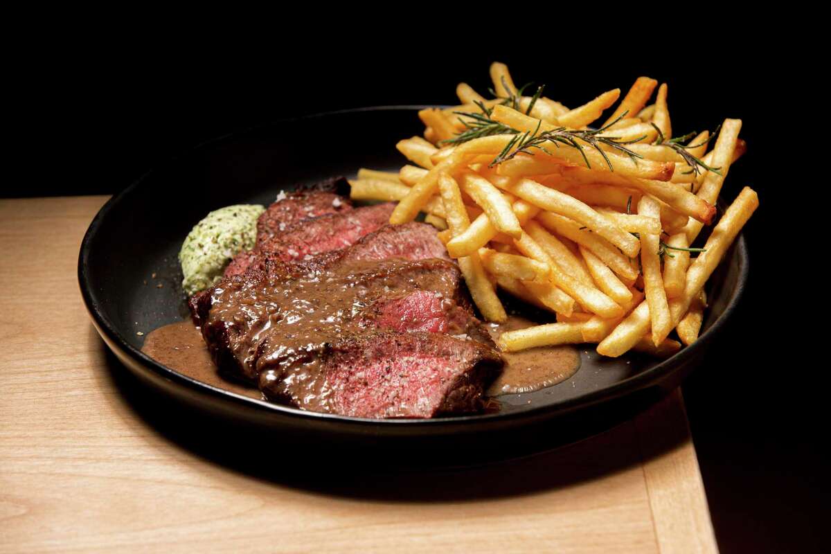 Steak Frites (grass fed sirloin steak, Beurre Maître d'Hôtel, shoestring fries, sierra porcini sauce) at Range Life, Saturday, Feb. 6, 2021, in Livermore, Calif.