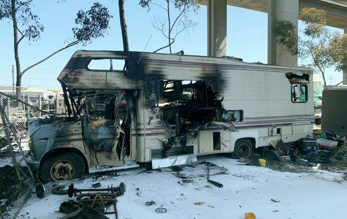 A fire that consumed multiple vehicles, including three RVs, in a West Oakland encampment Tuesday afternoon left one person dead and five more without shelter, officials said.