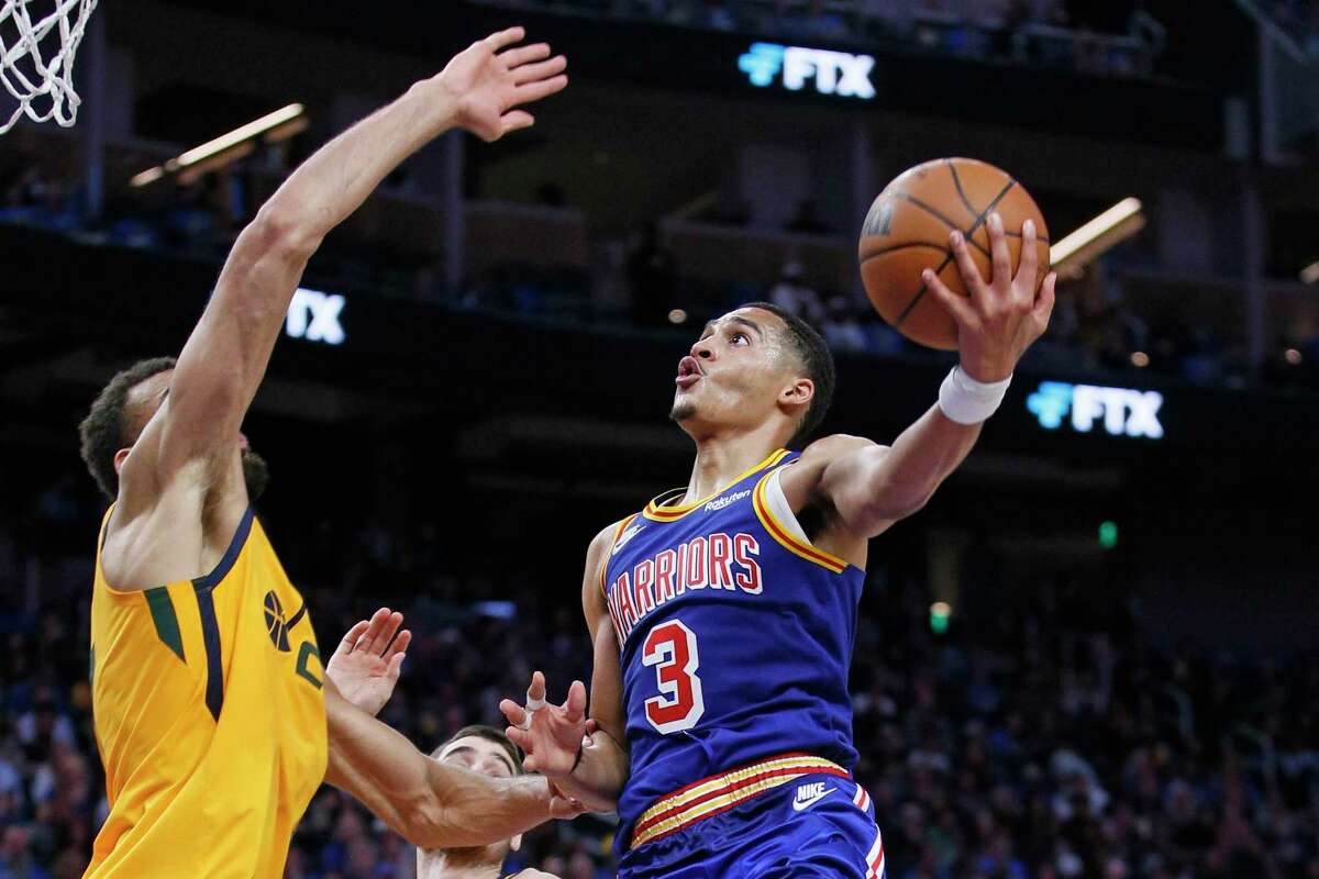 Golden State Warriors guard Jordan Poole (3) drives to the hoop in the second half of an NBA game against the Utah Jazz at Chase Center, Saturday, April 2, 2022, in San Francisco, Calif. The Warriors won 111-107.