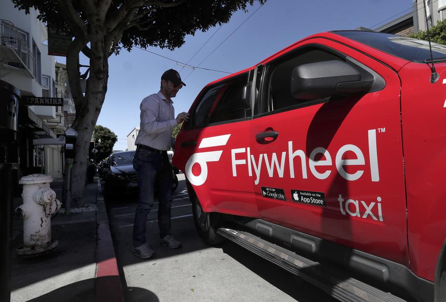 Uber signs with Yellow Cab SF and Flywheel Technologies to bring all of San Francisco's 1,075 taxis to its app in the coming months, after a similar deal in NYC (Carolyn Said/San Francisco Chronicle)