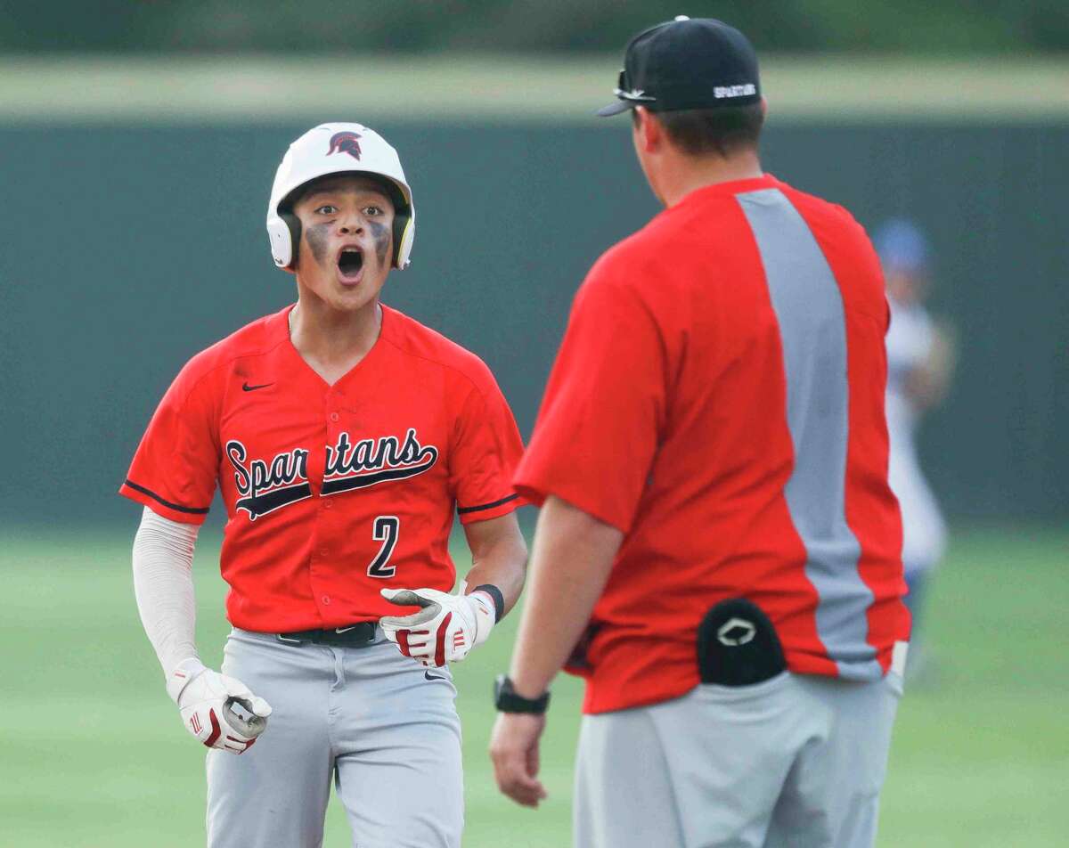 Ralph Martinez #2 of Porter reacts after hitting a single in the first inning of a District 20-5A high school baseball game, Tuesday, April 5, 2022, in New Caney.