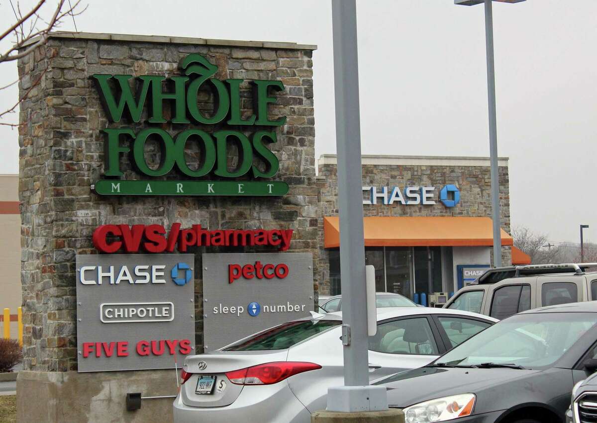 The sign for a Whole Foods grocery store in Fairfield in 2018. A Whole Foods is expected to come to Stamford soon.