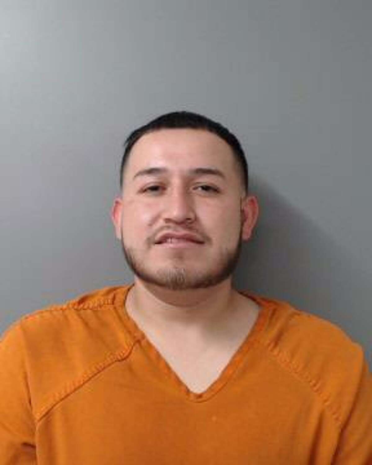 Jesus Abraham Vallejo-Adriano, 24, was served with an arrest warrant that charged him with aggravated assault with a deadly weapon.