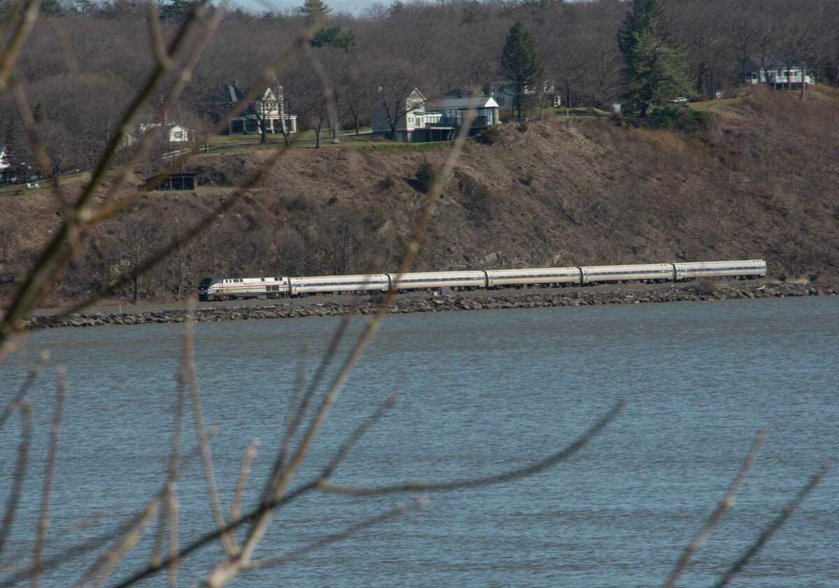 An Amtrak Train is seen pulling up to the Rhinecliff Amtrak Train Station from the Kingston Point Park on Tuesday, March 29, 2022 in Kingston, N.Y.