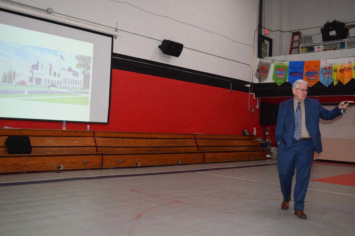 Superintendent Steve Ptacek presents the designs Tuesday for the Washington Elementary School project.
