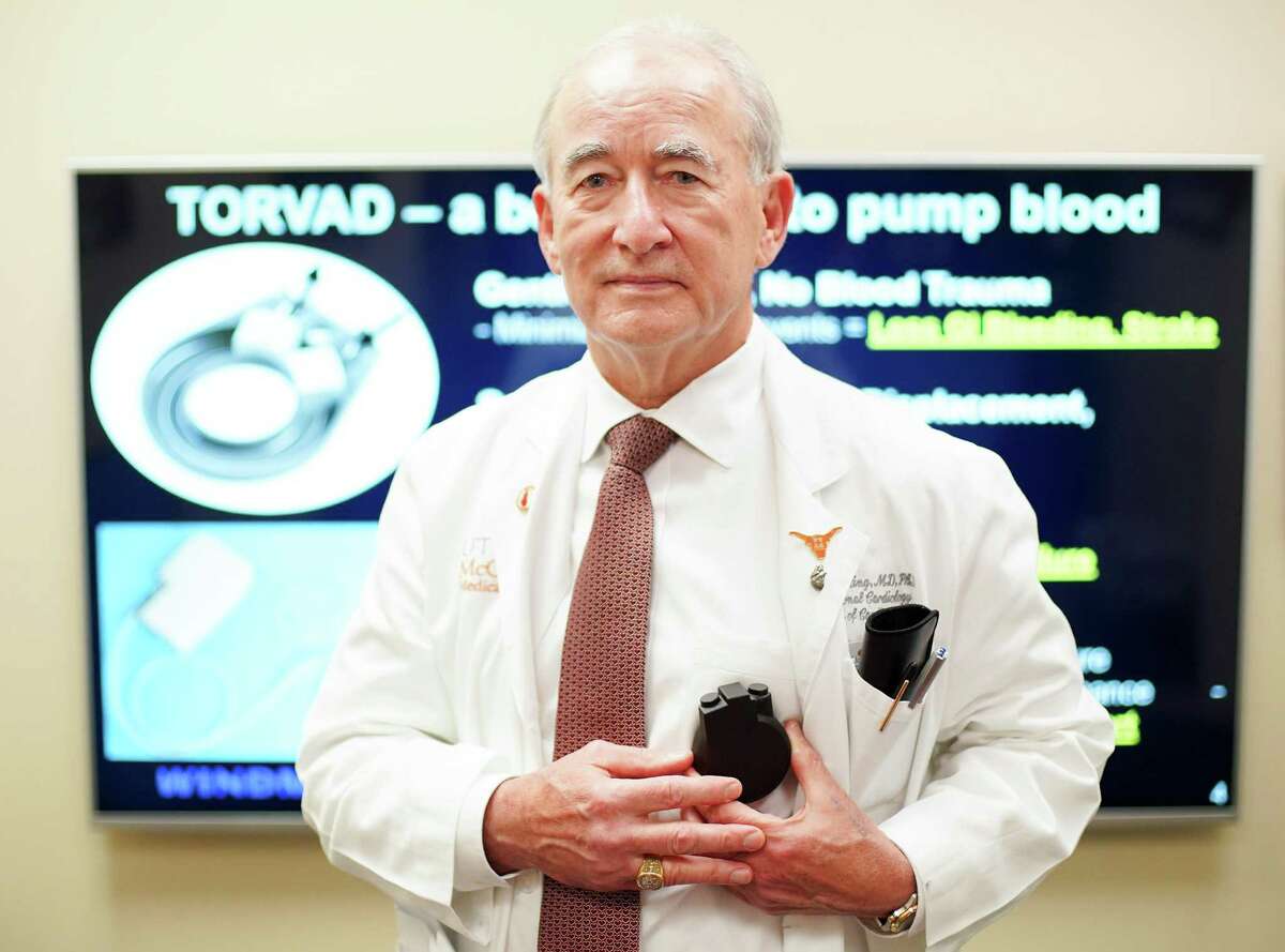 UT Health's Dr. Richard Smalling with an implantable pump he has been developing over the last 17 years in Houston on Wednesday, March 30, 2022. Dr. Smalling has been chosen by the American College of Cardiology and the NIH to compete in a pitch challenge on Saturday, April 2 at the National ACC Meeting.