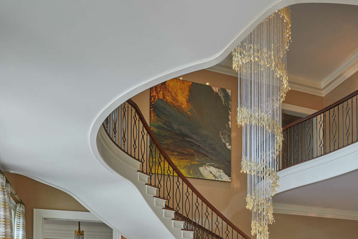The home on 555 Lake Avenue in Greenwich, Conn. has a three-story chandelier in its reception hall.