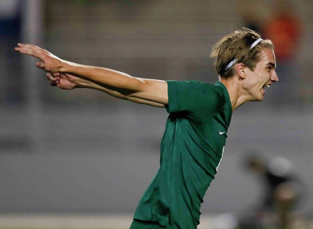 The Woodlands' Max Coady (19) celebrates after defeating Bridgeland 1-0 in the second period of a Region II-6A quarterfinal high school playoff soccer match at Woodforest Bank Stadium, Friday, April 1, 2022, in Shenandoah.