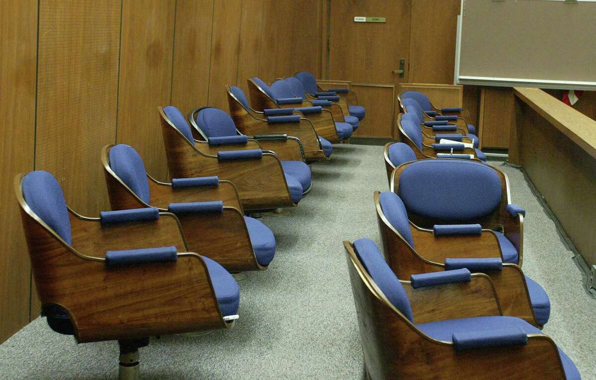 A jury box in a Los Angeles County courtroom sits empty. A state appeals court ordered a new trial for a man convicted of murder in L.A. County, because it determined the dismissal of a Black juror was “more likely than not attributable to unconstitutional discrimination.”