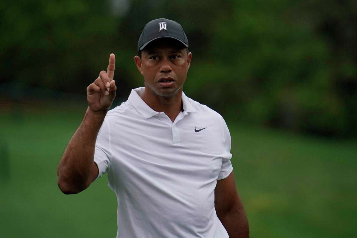 Tiger Woods asks for another ball before teeing off on the 12th hole during a practice round for the Masters golf tournament on Wednesday, April 6, 2022, in Augusta, Ga.
