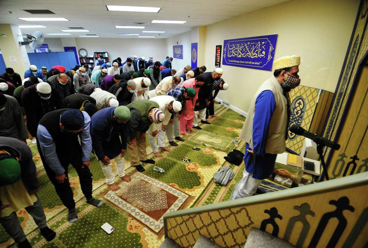 Imam Hafiz Haqqani M. Qadri leads prayer for area Muslims during Ramadan at Stamford Islamic Center in Stamford, Conn., on Tuesday April 5, 2022. Ramadan, is the ninth month of the Islamic calendar, and observed by Muslims worldwide as a month of fasting, prayer, reflection and community.
