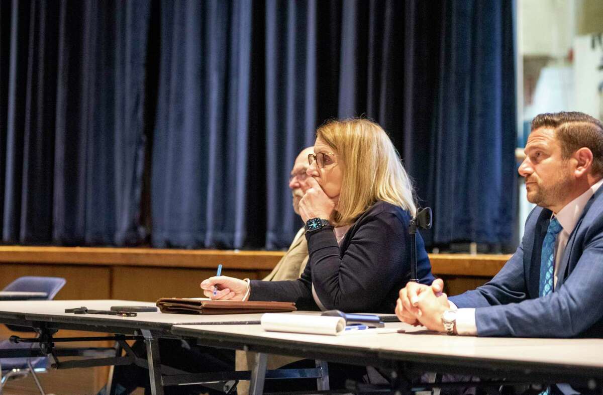 Construction Solutions Group chief operating officer Roger LaFleur, education specialist Fran DiFiore and vice president Chris Cykley listen to input from community members Tuesday, April 5, 2022. CSG is drafting the education specifications for the new Central Middle School building.