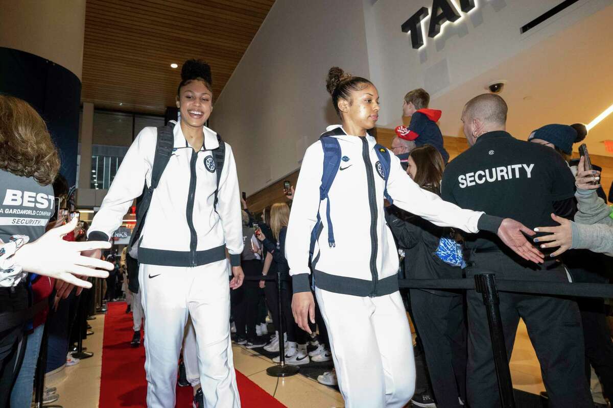 UConn’s Olivia Nelson-Ododa and Evina Westbrook arrive to the arena for a game against South Carolina in the NCAA Tournament championship on April 3.
