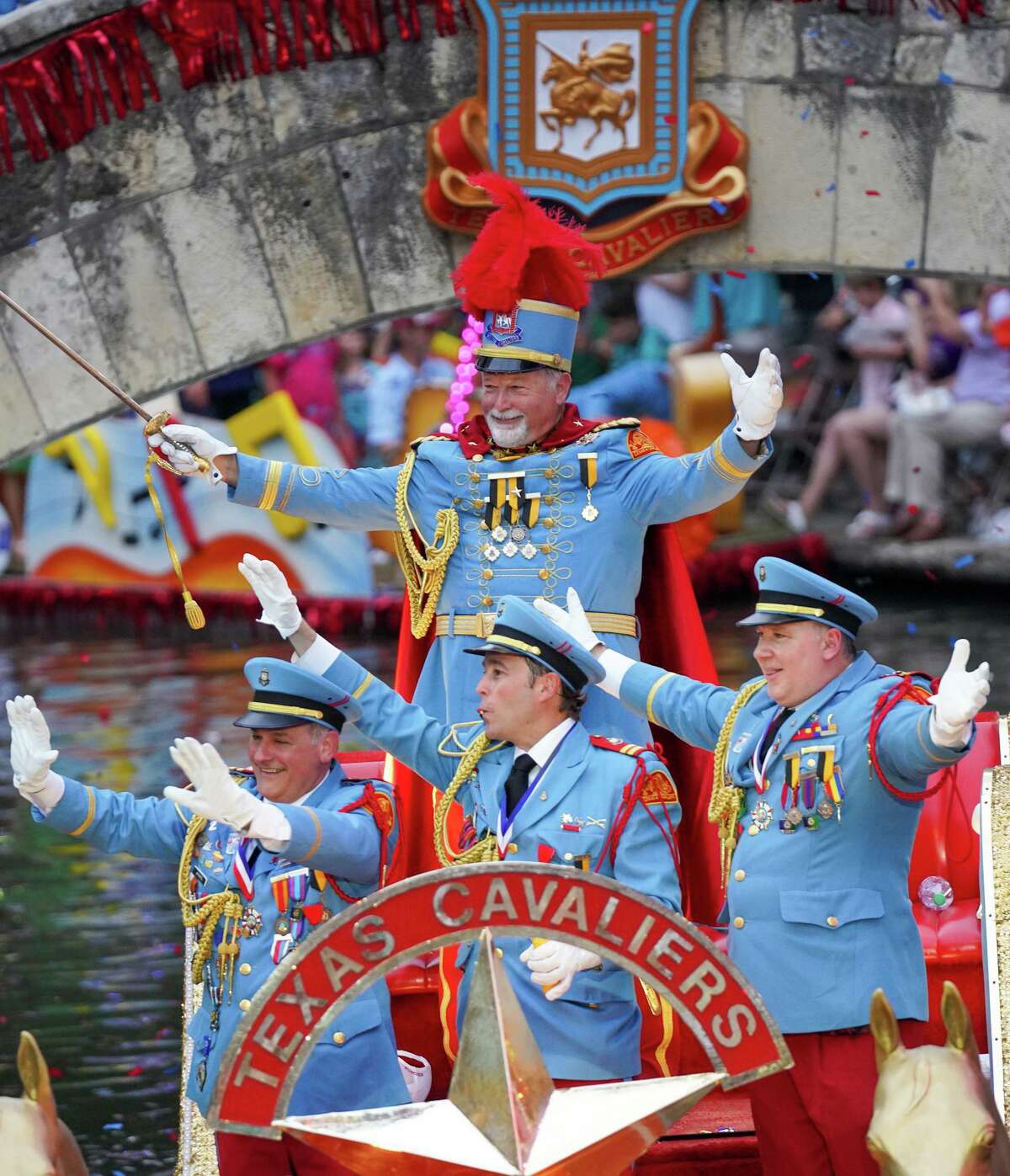King Antonio Barton Tinsley Simpson enters the Arneson River Theatre on Monday evening during the annual Texas Cavaliers River Parade downtown.