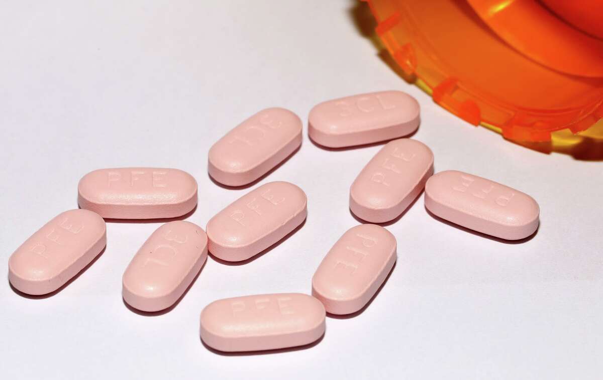 Pfizer’s new Paxlovid tablets, shown here in March, 2022, are part of President Biden’s strategy to enable pharmacies, long-term care facilities and community health centers to give out pills that combat COVID-19.