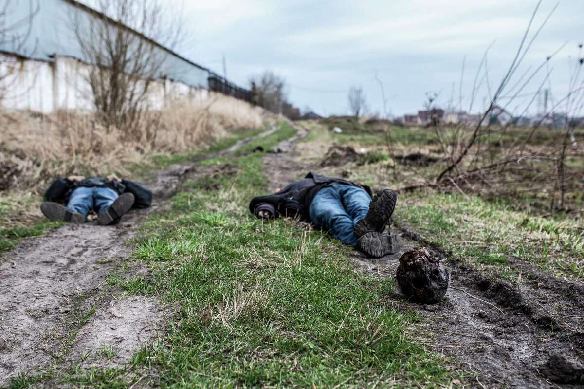 Investigators say these two bodies were tortured by Russian troops in Bucha. One victim was beheaded.