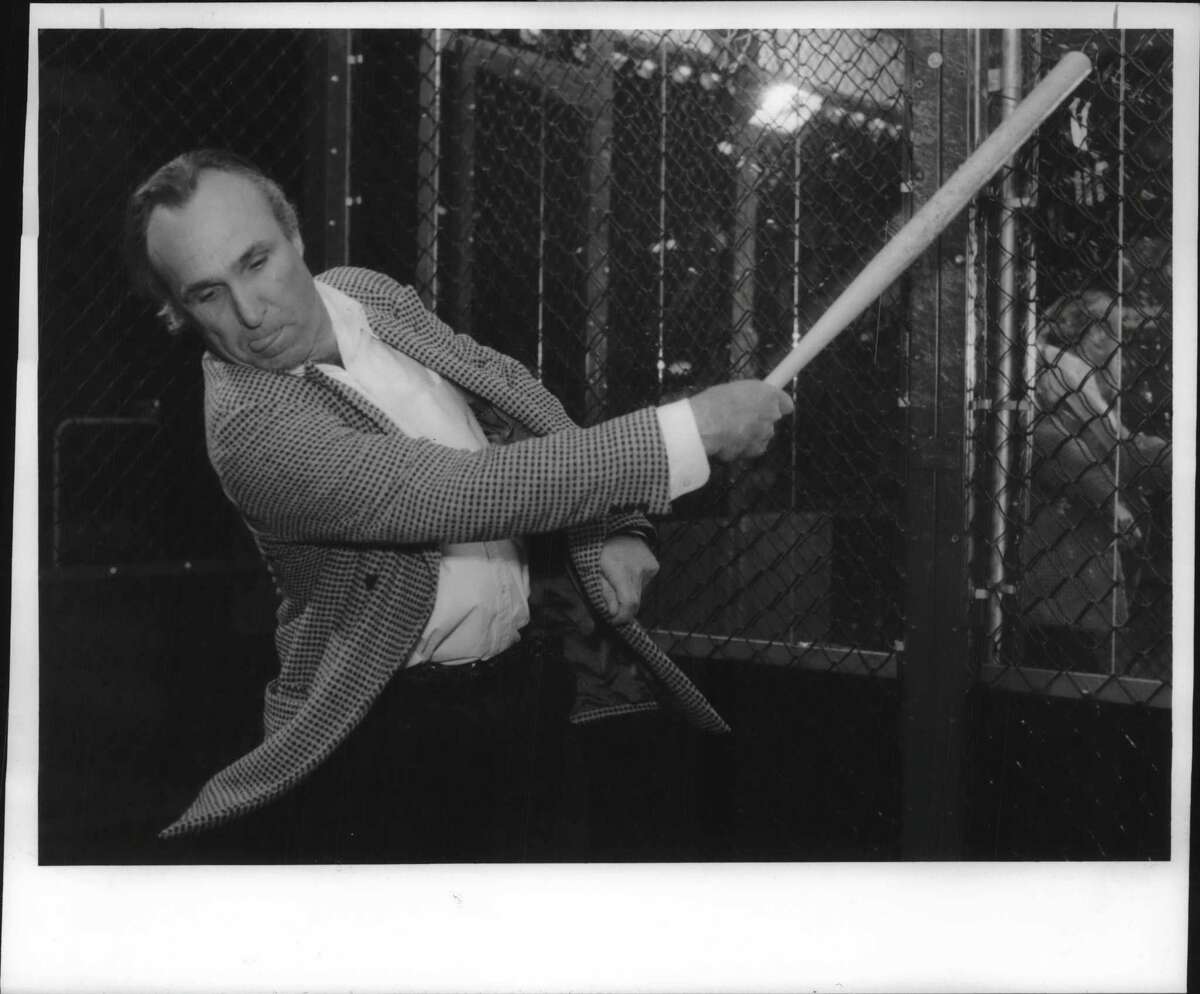 "Bull Durham" and "Cobb" screenwriter and director Ron Shelton takes a swing with a plastic baseball bat as he practiced hitting in a batting cage at an Albany sports bar in February 1995. Shelton was in town for an appearance with the New York State Writers Institute. (Steve Jacobs/Times Union Archive)