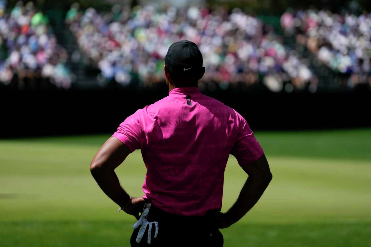 Tiger Woods waits to play on the fifth hole during the first round at the Masters golf tournament on Thursday, April 7, 2022, in Augusta, Ga.