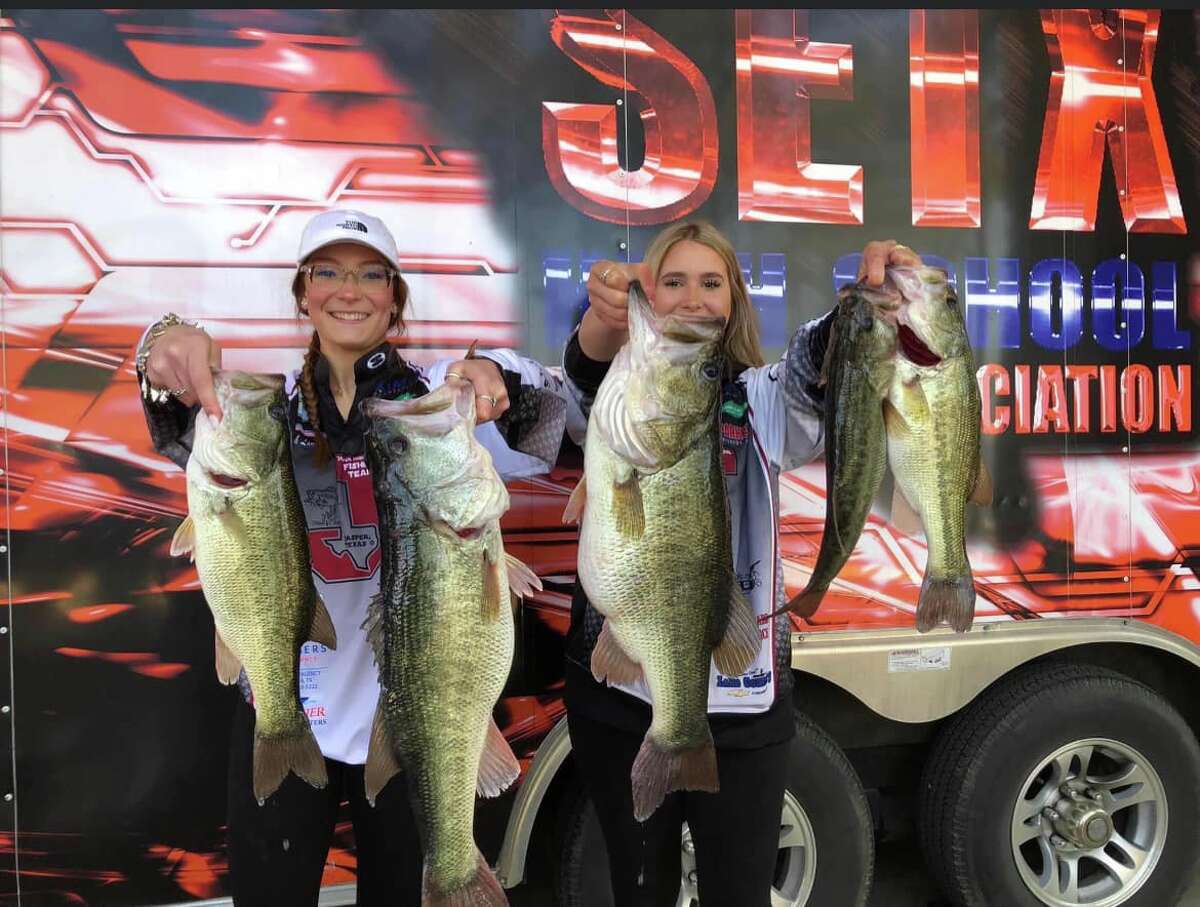 Jasper High School lady anglers Kileigh Isom (left) and Savannah Landers reeled in five bass weighing 23.97 pounds to top 474 teams in the Southeast Texas High School Bass Fishing Association team tournament held March 19 on Sam Rayburn.