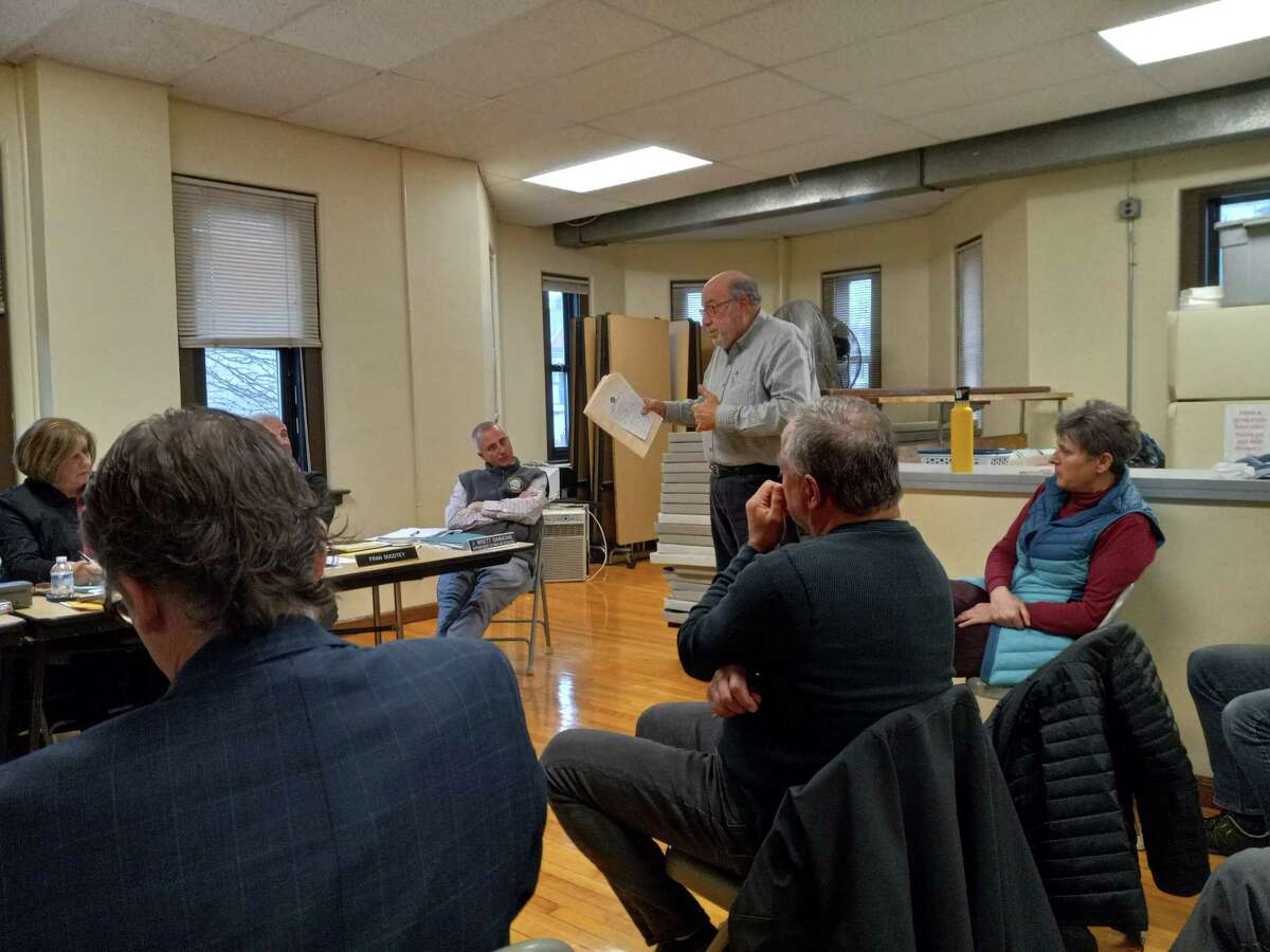 Torrington's Parks and Recreation Commission met Wednesday night to discuss the location of the town's skate park. School Building Committee co-chairman Ed Arum, standing at right, spoke during the meeting.