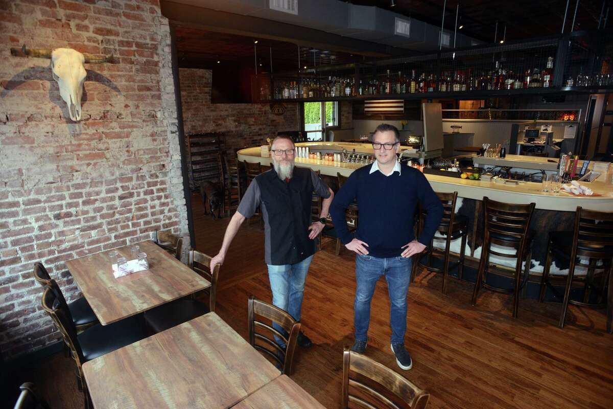 Owners Steve Garrett, left, and Eric Patterson at Post Oak Barbecue Co., in Fairfield, Conn. April 7, 2022.