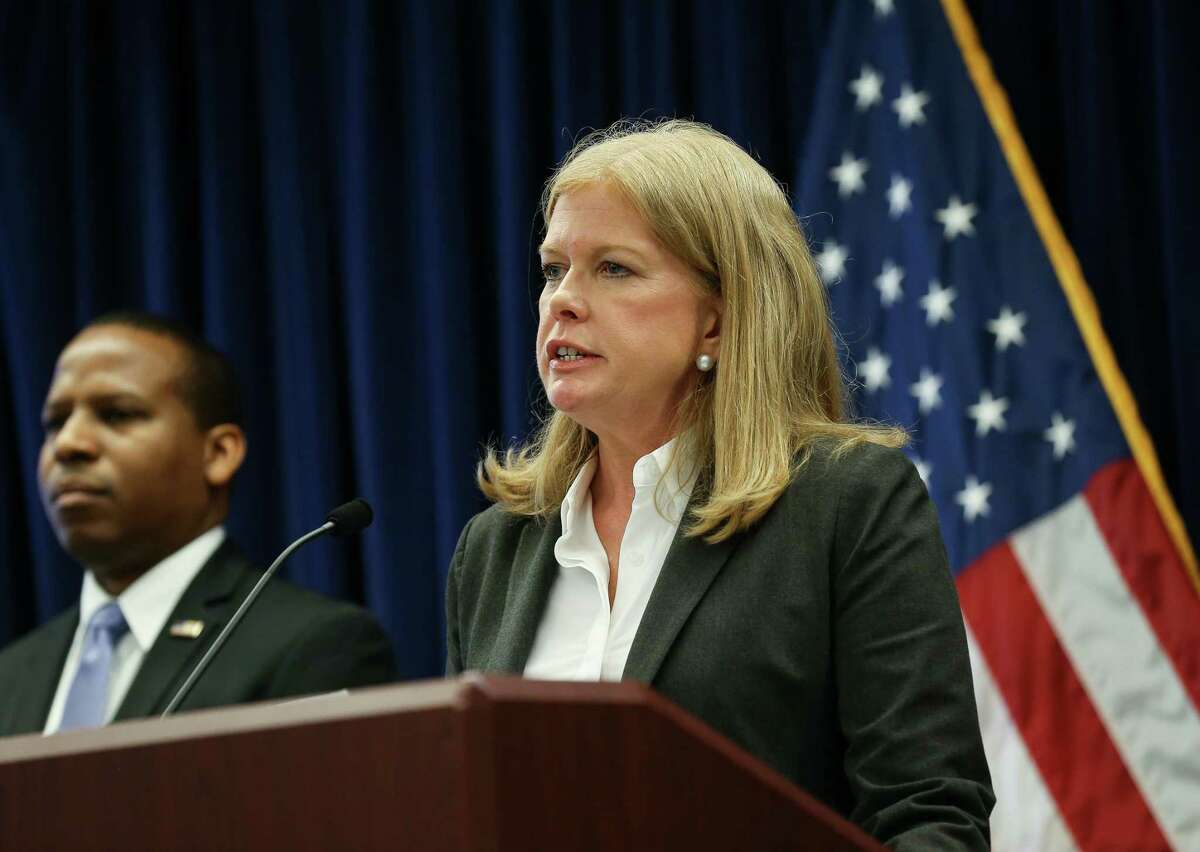 Acting U.S. Attorney Southern District of Texas Jennifer B. Lowery, center, talks about the new tax charges against Brian Busby - former chief operating officer of the HSID - in relation to bribery scheme during a press conference at the United States Attorney’s Office on Thursday, April 7, 2022, in Houston.