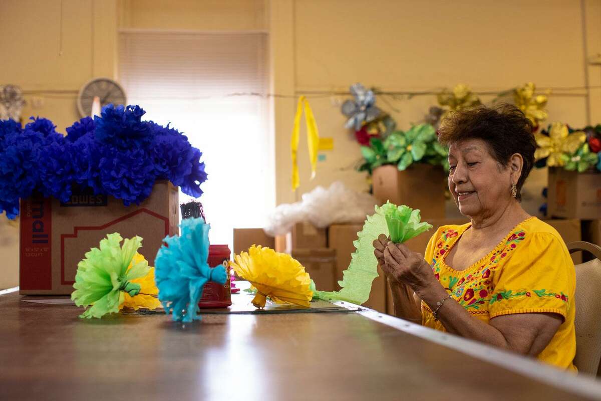 Rose Garcia has made paper and foil flowers for Fiesta’s Battle of the Flowers parade for more than 50 years. Garcia starts crafting the thousands of blooms in early March, so they will complement the Fiesta royalty’s outfits and can be ready in advance.