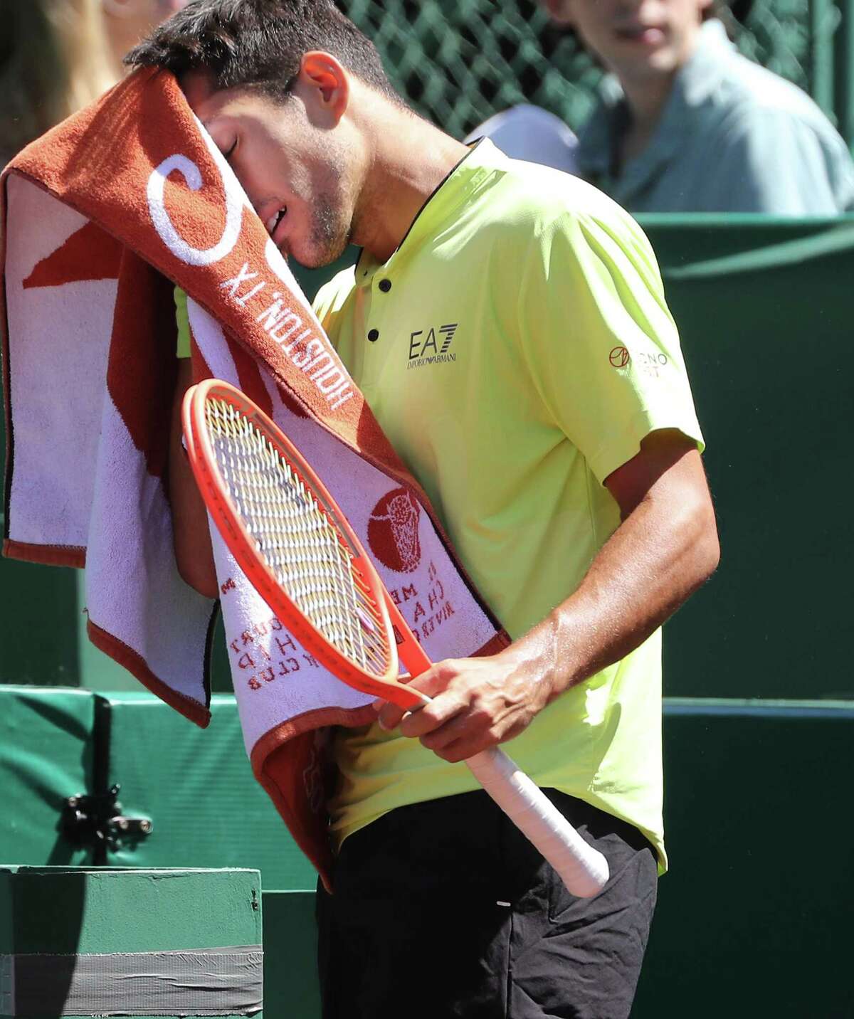 Christian Garin, CHI, wipes his face between points as he takes on Jordan Thompson, AUS compete in the second round of the Fayez Sarofim & Co. U.S. Men’s Clay Court Championship at River Oaks Country Club in Houston on Thursday, April 7, 2022.