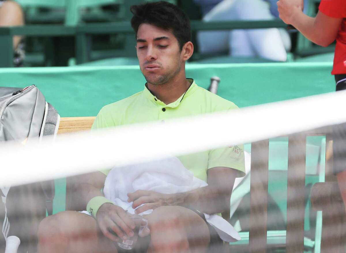 Christian Garin, CHI, takes a breath after finding himself down in the match against Jordan Thompson, AUS compete in the second round of the Fayez Sarofim & Co. U.S. Men’s Clay Court Championship at River Oaks Country Club in Houston on Thursday, April 7, 2022.